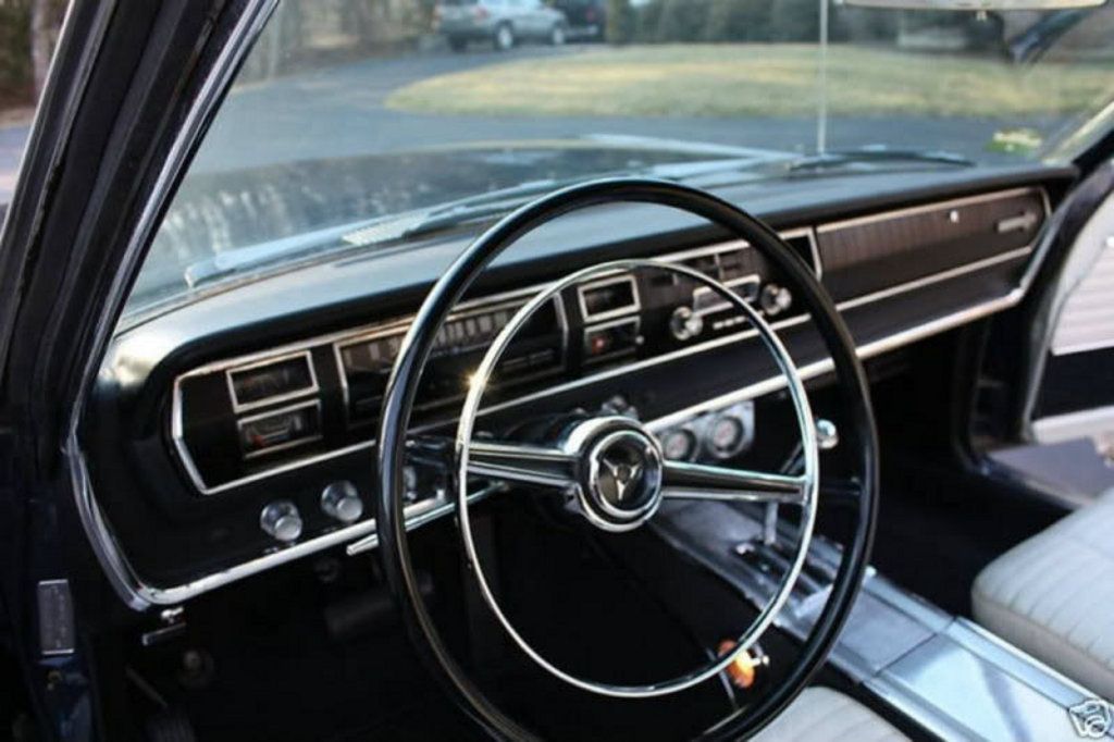 [Image: 1966Coronet-Black2SpokeSteeringWheelWith...rnRing.jpg]