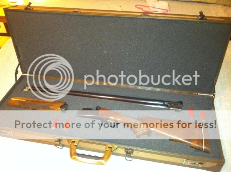 Weatherby Orion 12g O/U (skb manufacture) 28" tubes, 5 chokes, case